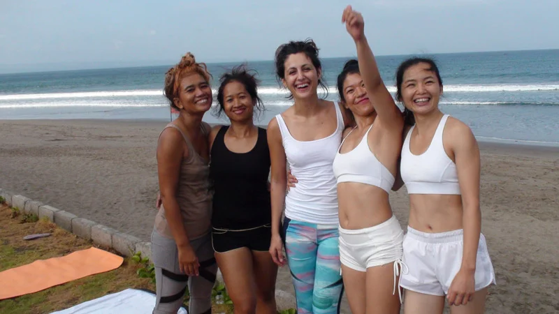 celebrities doing yoga yoga pose on the beach