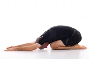 YogaFX Men doing child pose YogaFX Seminyak RYT 200 Hour Yoga Teacher Training Course Bali