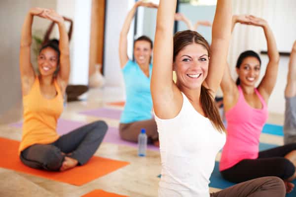 YogaFX Group Woman doing yoga in class