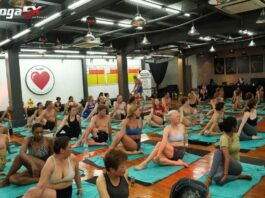 200-Hour Yoga Teacher Training Retreats: Intensive vs Multi-Week Yoga teacher training students practicing hot yoga postures in Bali's natural tropical heat, never an electric heater, during a 6-day intensive retreat