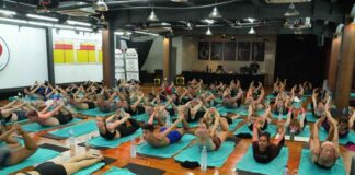 A YogaFX cohort of 19 students training together in the Seminyak, Bali studio, the setting covered by the flat USD 1,699 Bikram Hot 26&2 program fee.