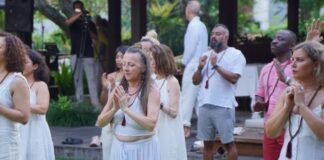 YogaFX graduates celebrating on Graduation Day at the Seminyak, Bali studio, part of a cohort representing the academy's 1,500+ alumni across 80+ countries.