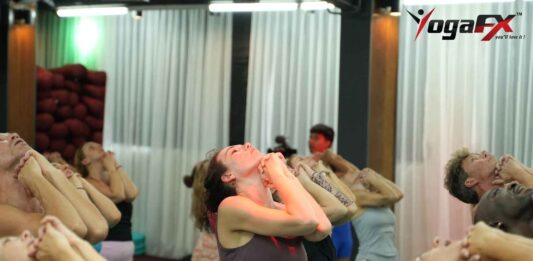 Singapore student practicing Bikram Hot 26&2 posture during YogaFX teacher training in Bali