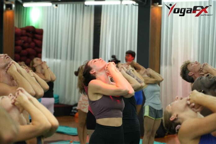 Singapore student practicing Bikram Hot 26&2 posture during YogaFX teacher training in Bali