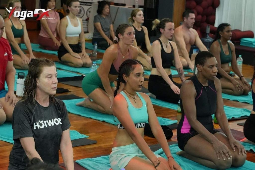 How Many Hours Do You Need to Become a Yoga Instructor? 2 YogaFX's hybrid yoga teacher training format, combining online theory hours with a 6-day in-person intensive in Bali
