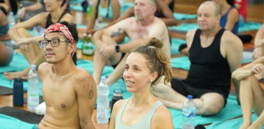 Yoga Teacher Training Scholarships: What Actually Exists and How to Find One Yoga teacher training candidate researching scholarship and financial aid options for a destination yoga teacher training program in Bali