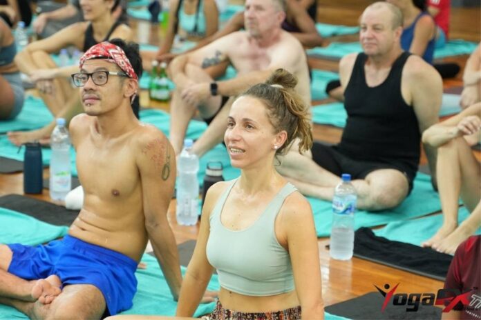 Yoga teacher training candidate researching scholarship and financial aid options for a destination yoga teacher training program in Bali Yoga teacher training candidate researching scholarship and financial aid options for a destination yoga teacher training program in Bali